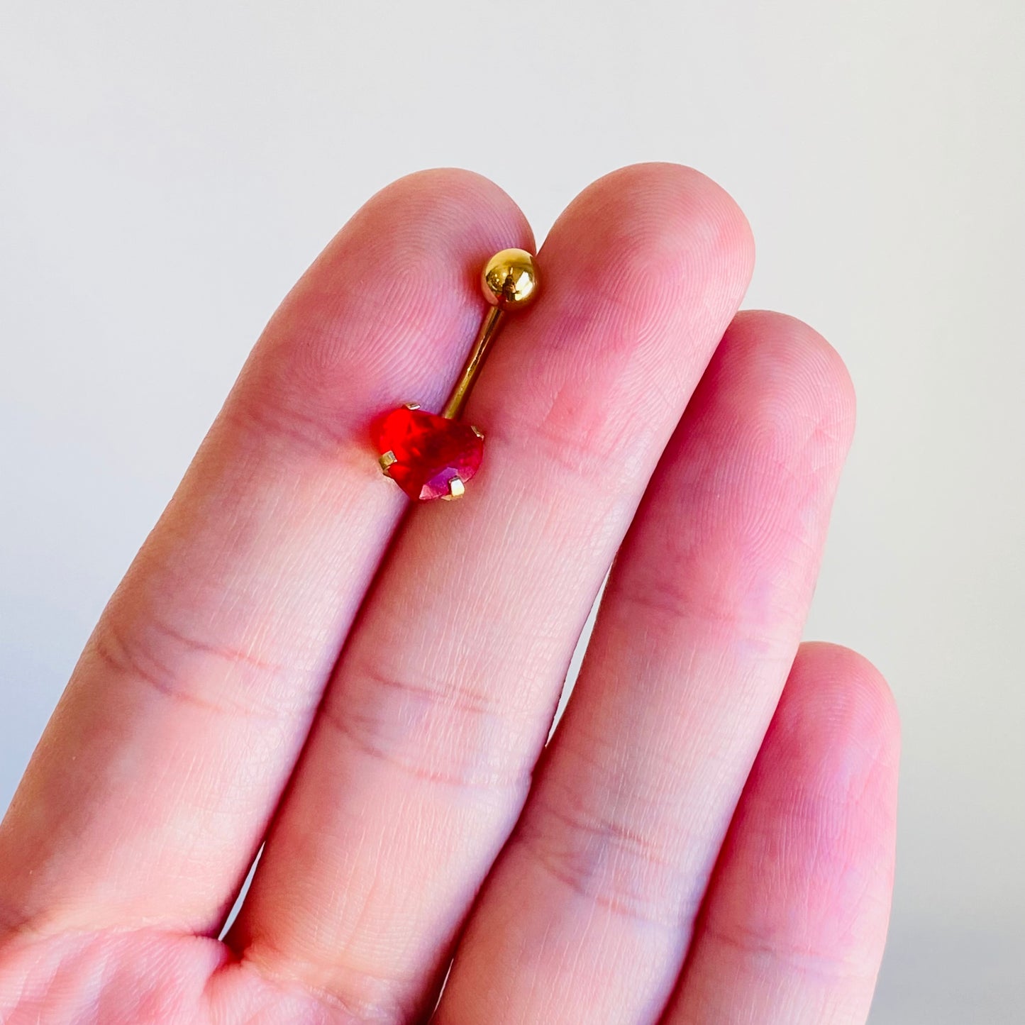 Gold Steel Prong Set Ruby Heart CZ Ion Plated Belly Ring