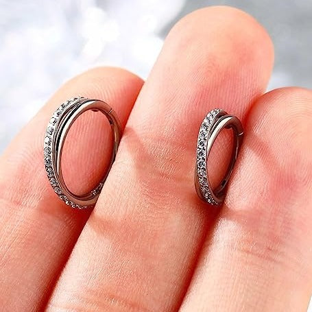 G23 Titanium Paved CZ Crisscross Hinged Segment Clicker Ring