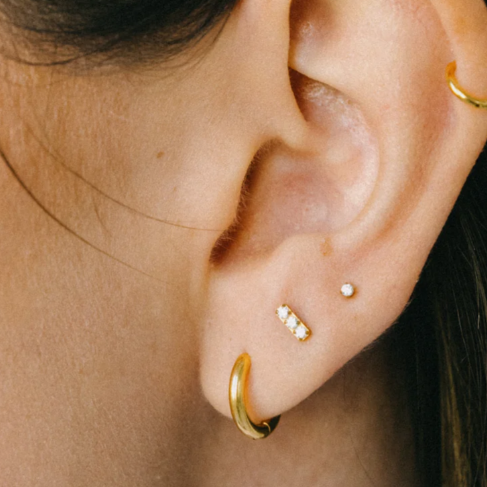 G23 Gold PVD Titanium Internally Threaded Triple CZ Bar Labret