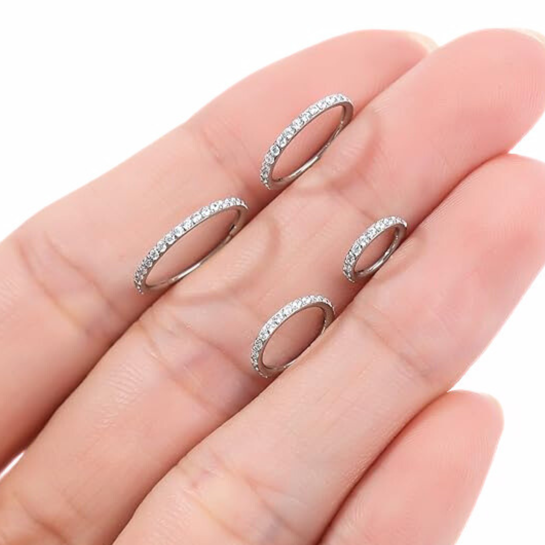 G23 Titanium Paved CZ Rim Hinged Segment Clicker Ring